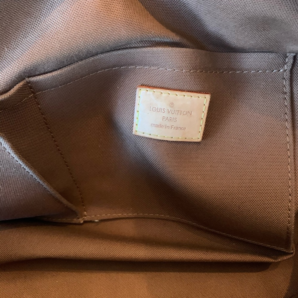 Louis Vuitton Riveting purse - Picture 7 of 7